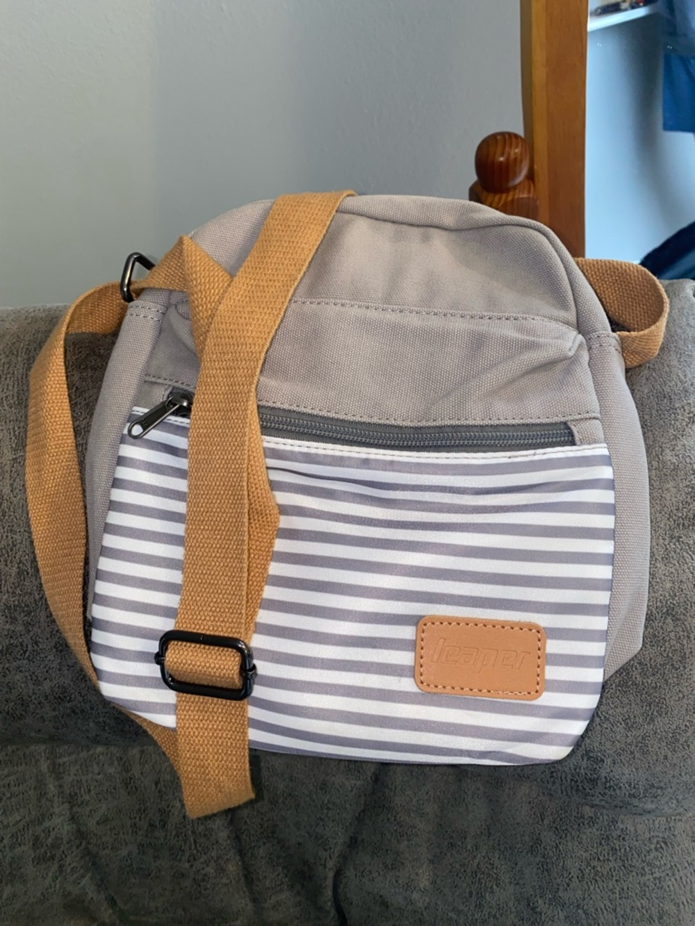 Leaper Neutral Gray Crossbody Bag with Tan Strap